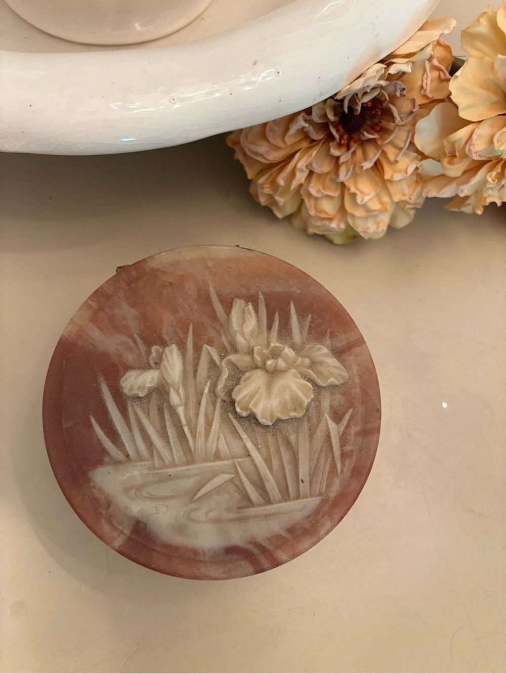 Carved Floral Stone Disk Accent - Cream on Brown